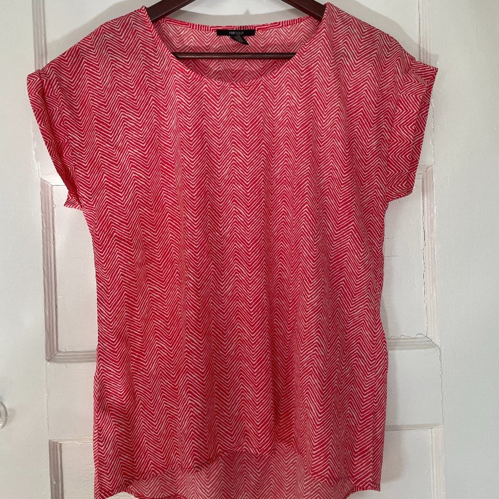 Red patterned blouse